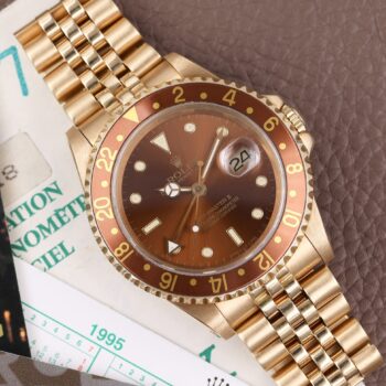 Rolex GMT-Master II 16718 Jubilee Tiger Eye Full Set 1995